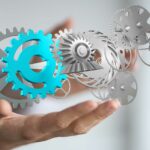Innovación técnica | Mejora sin parar los procesos en tu empresa mano_sostiene_engranes_innovación_tecnica